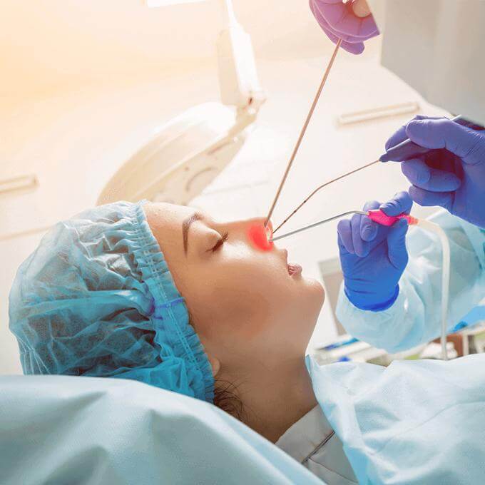 tubes inserted to the patient nose for check sinus level